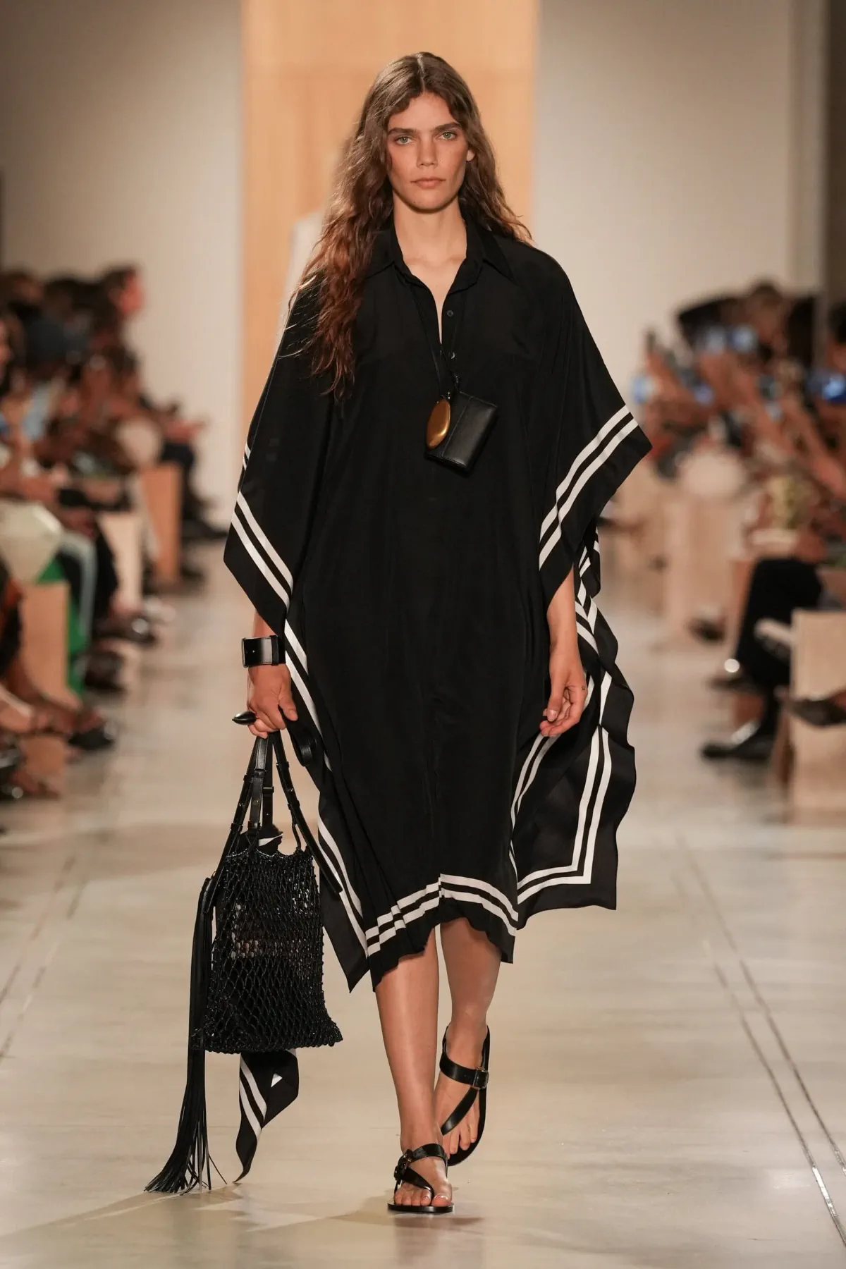 The Michael Kors Spring/Summer 2026 collection showcases a new, sophisticated ease