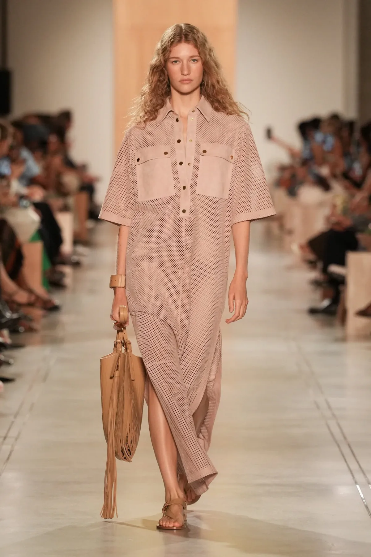 The Michael Kors Spring/Summer 2026 collection showcases a new, sophisticated ease