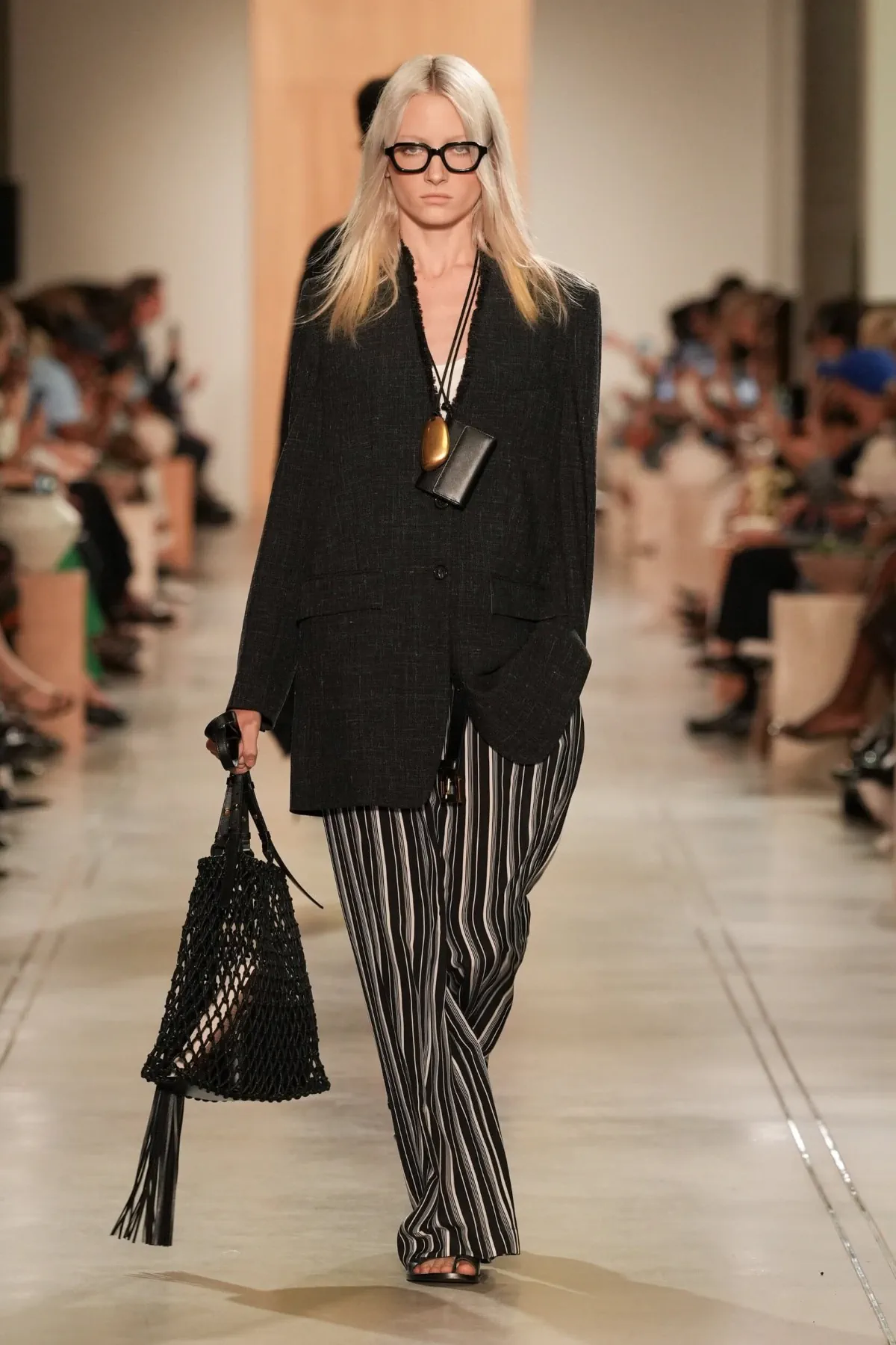 The Michael Kors Spring/Summer 2026 collection showcases a new, sophisticated ease
