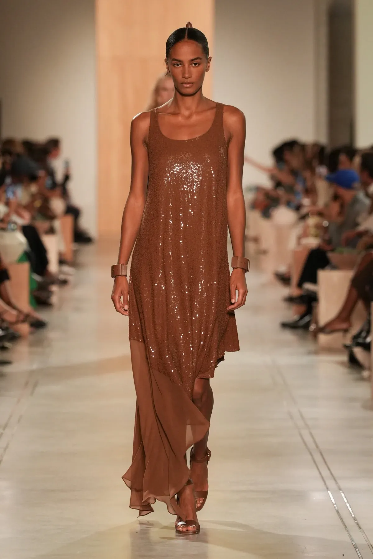The Michael Kors Spring/Summer 2026 collection showcases a new, sophisticated ease