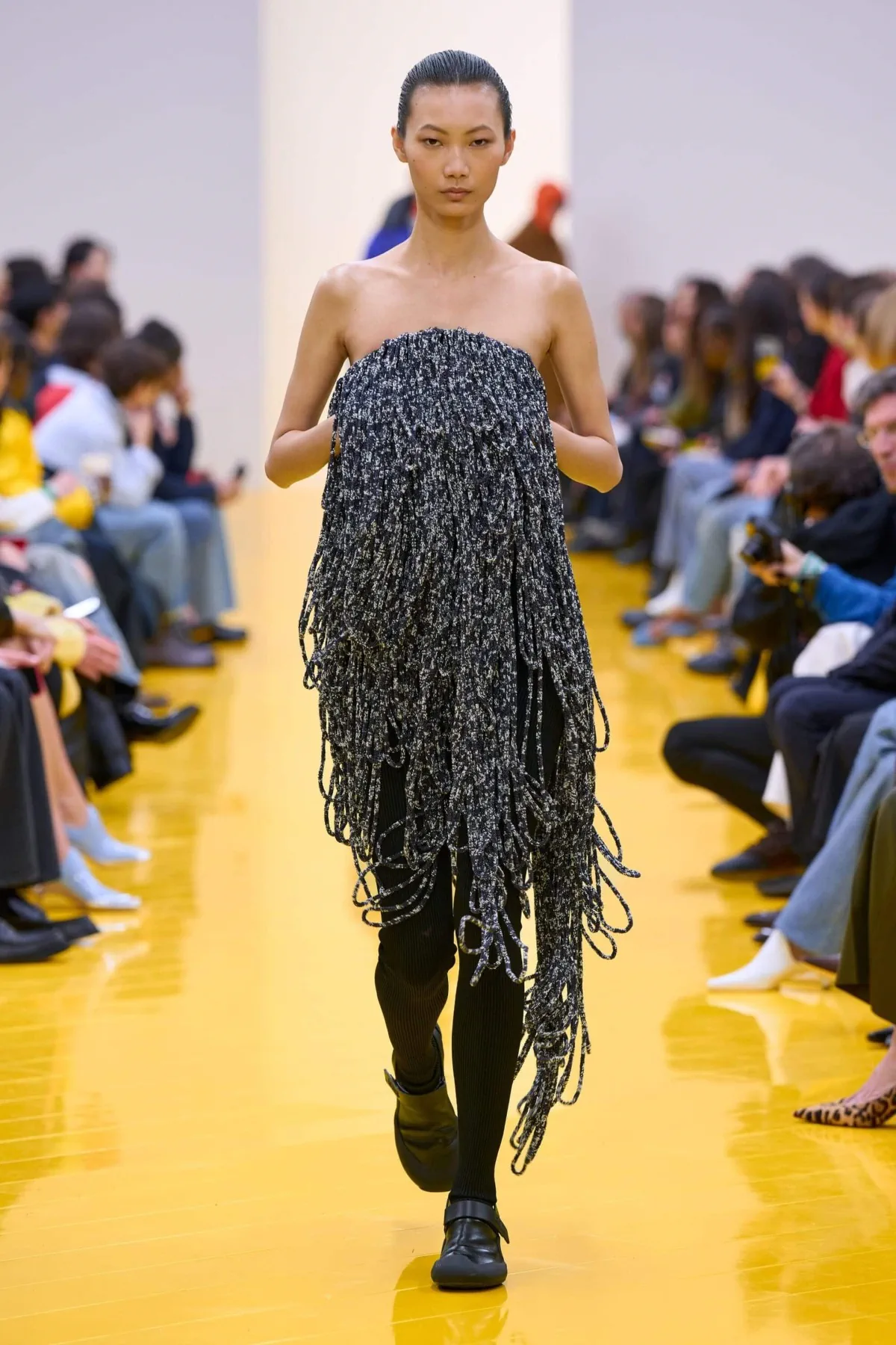 Loewe Fall 2026 reinvents craft through latex, sculpture and menswear Loewe Fall-Winter 2026 - Paris Fashion Week