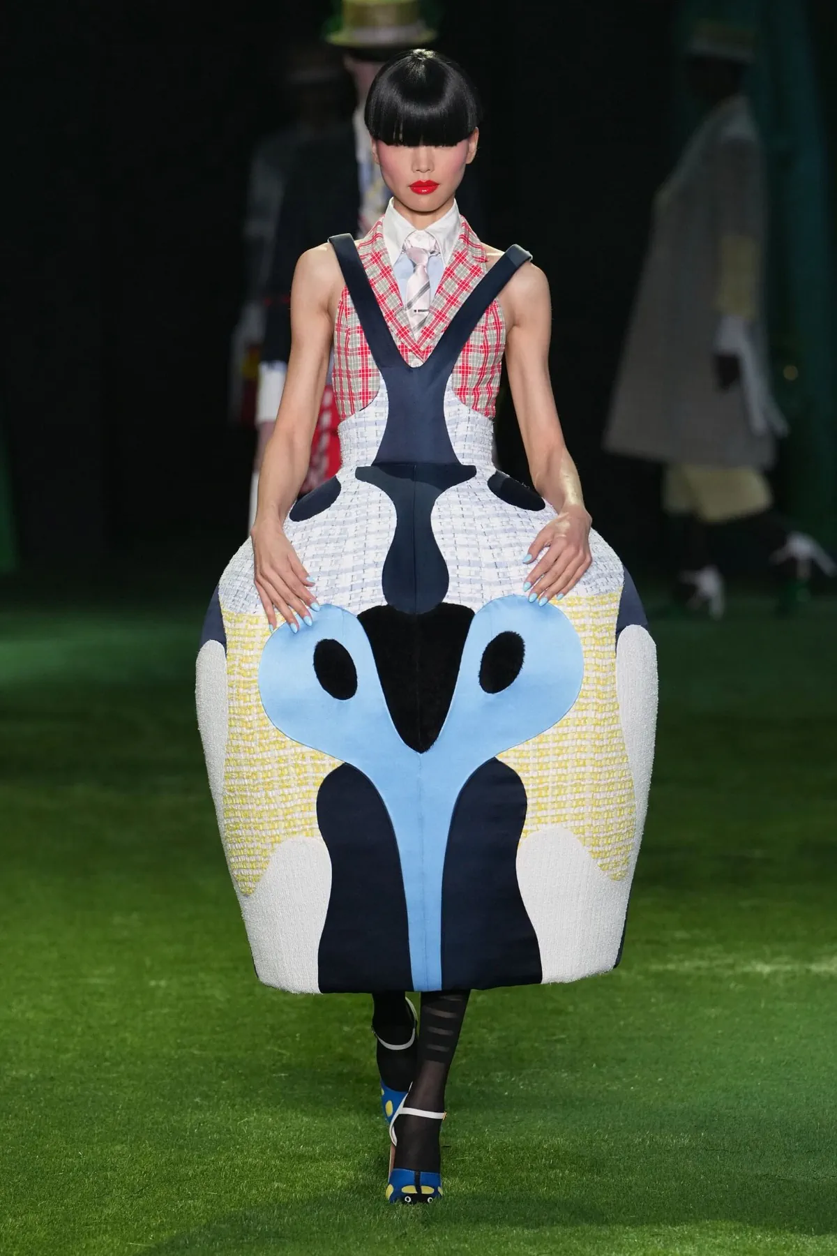 Thom Browne Spring 2027 turns metamorphosis into high fashion Thom Browne Spring 2027 turns metamorphosis into high fashion
