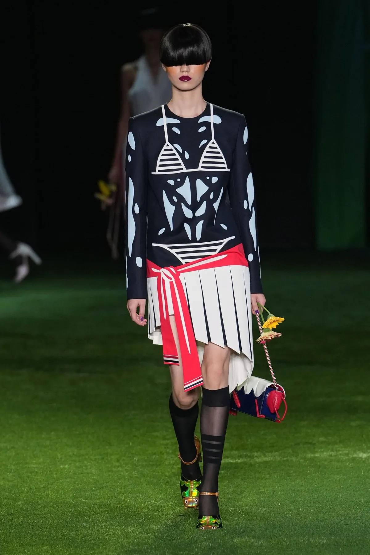 Thom Browne Spring 2027 turns metamorphosis into high fashion Thom Browne Spring 2027 turns metamorphosis into high fashion
