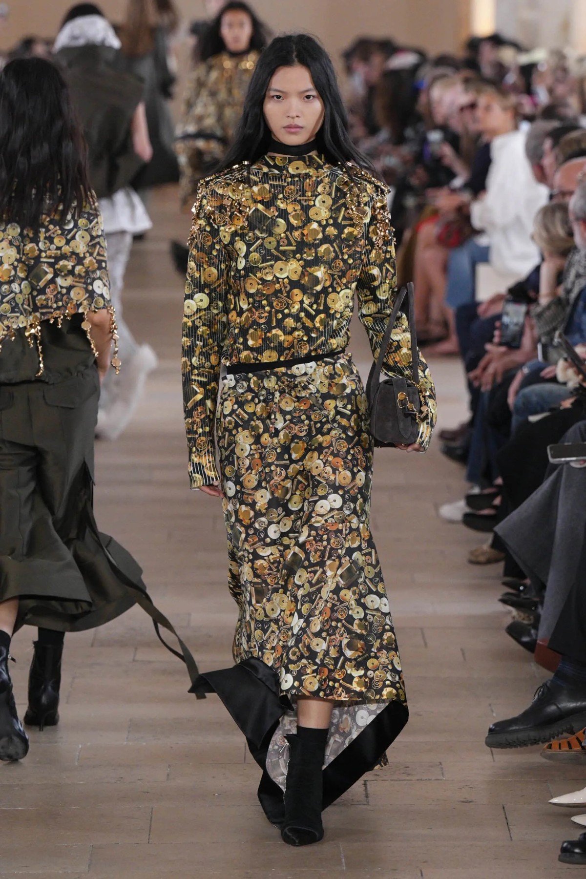 Sacai Spring 2027 examines clothing from the inside out Sacai Spring-Summer 2027 - Paris Fashion Week