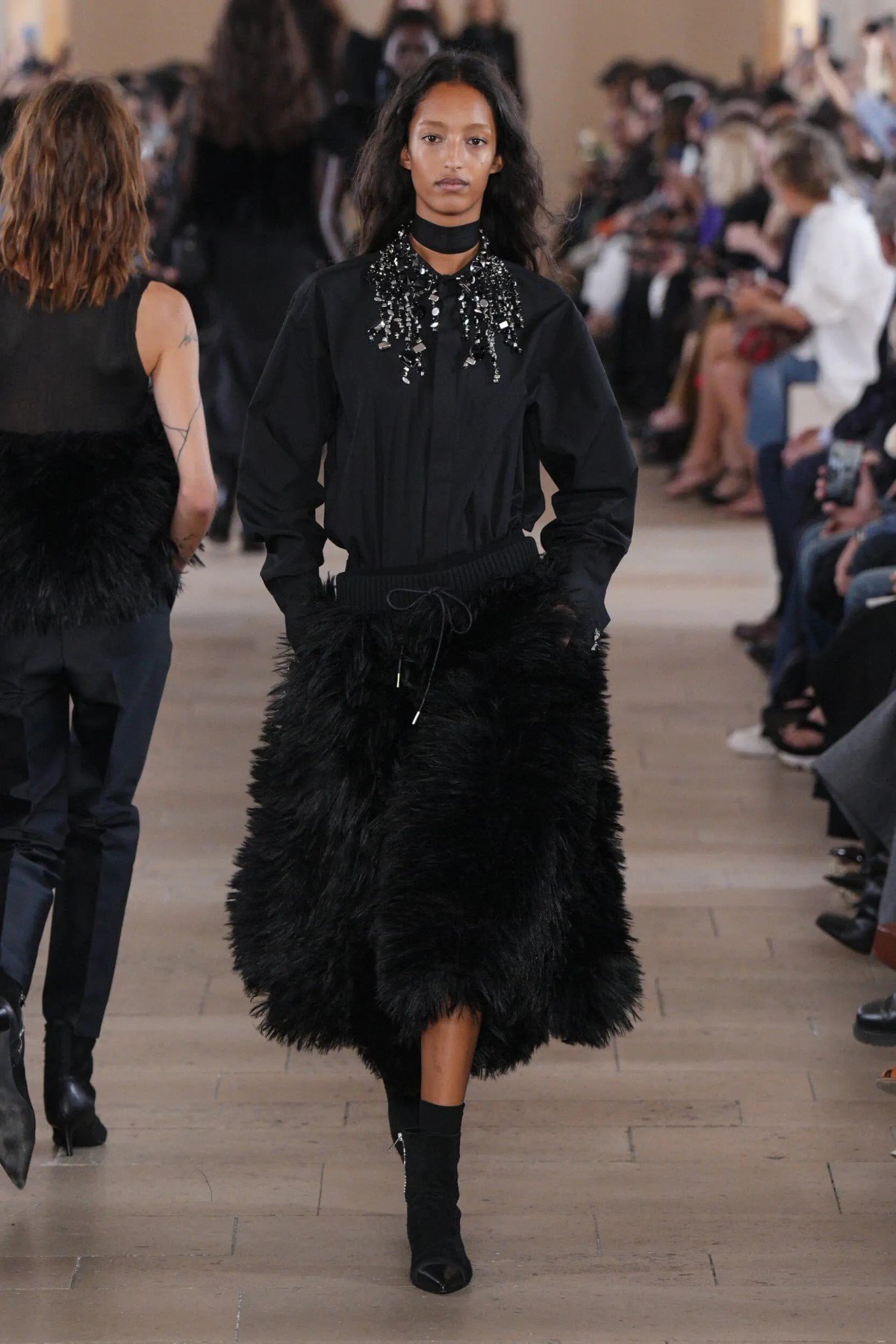 Sacai Spring 2027 examines clothing from the inside out Sacai Spring-Summer 2027 - Paris Fashion Week
