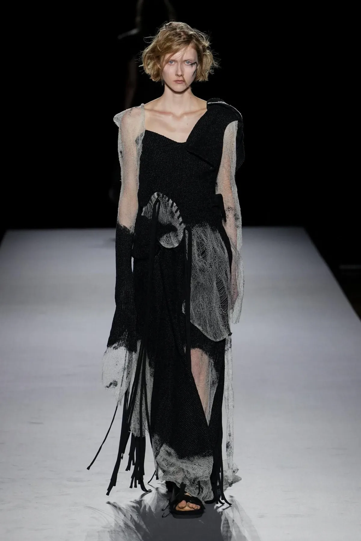 Yohji Yamamoto Spring 2027 finds form in fringes and unfinished structure Yohji Yamamoto Spring-Summer 2027 - Paris Fashion Week