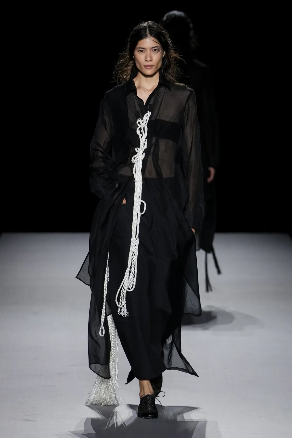 Yohji Yamamoto Spring 2027 finds form in fringes and unfinished structure Yohji Yamamoto Spring-Summer 2027 - Paris Fashion Week