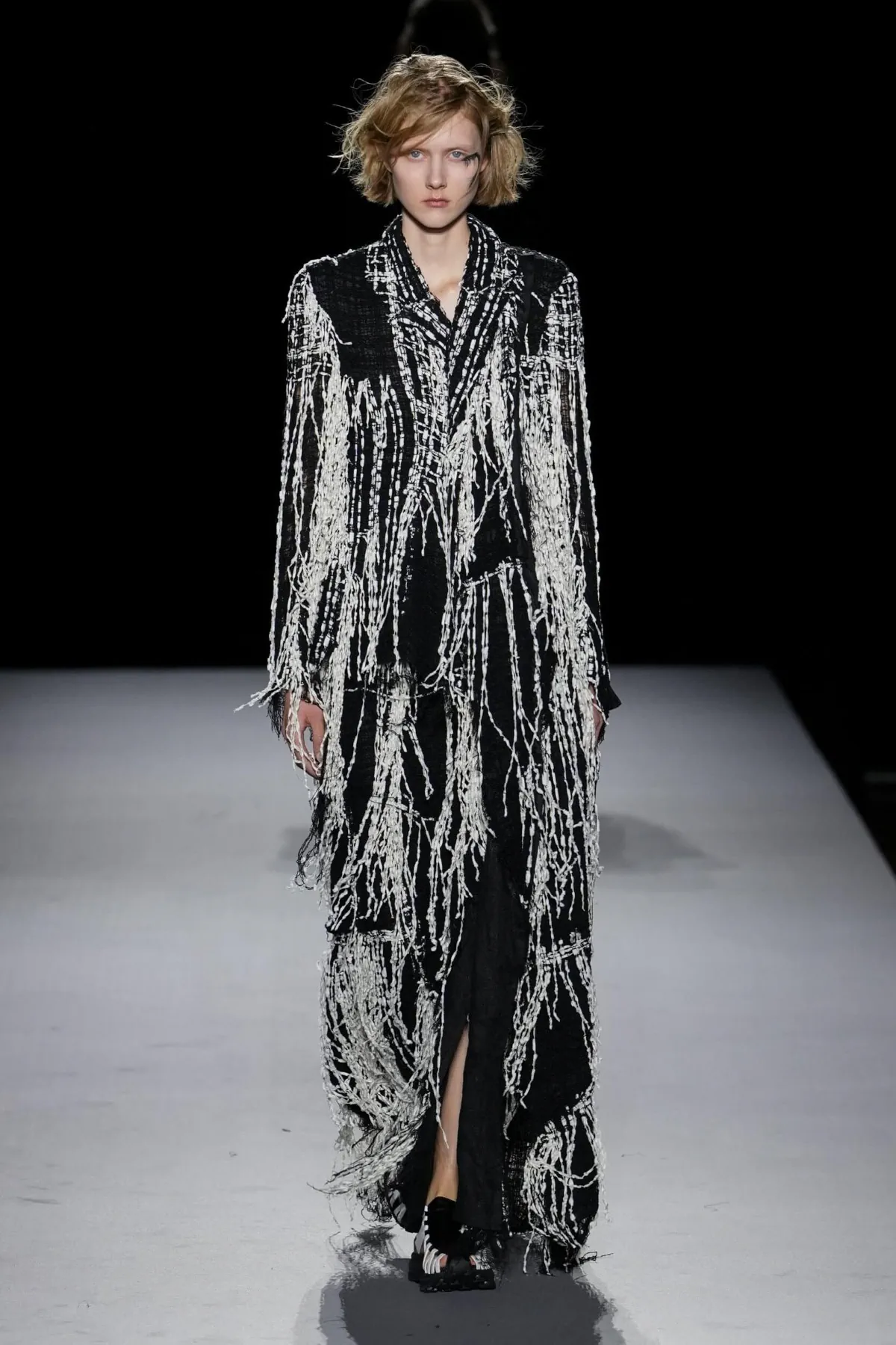 Yohji Yamamoto Spring 2027 finds form in fringes and unfinished structure Yohji Yamamoto Spring-Summer 2027 - Paris Fashion Week